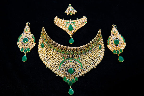 Gold plated emeralds stones with polki