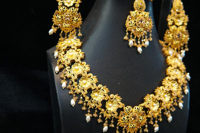 Gold plated set with real stones